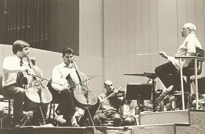 cellists Honigberg and Teie performing the Ott Concerto under the direction of Rostropovich